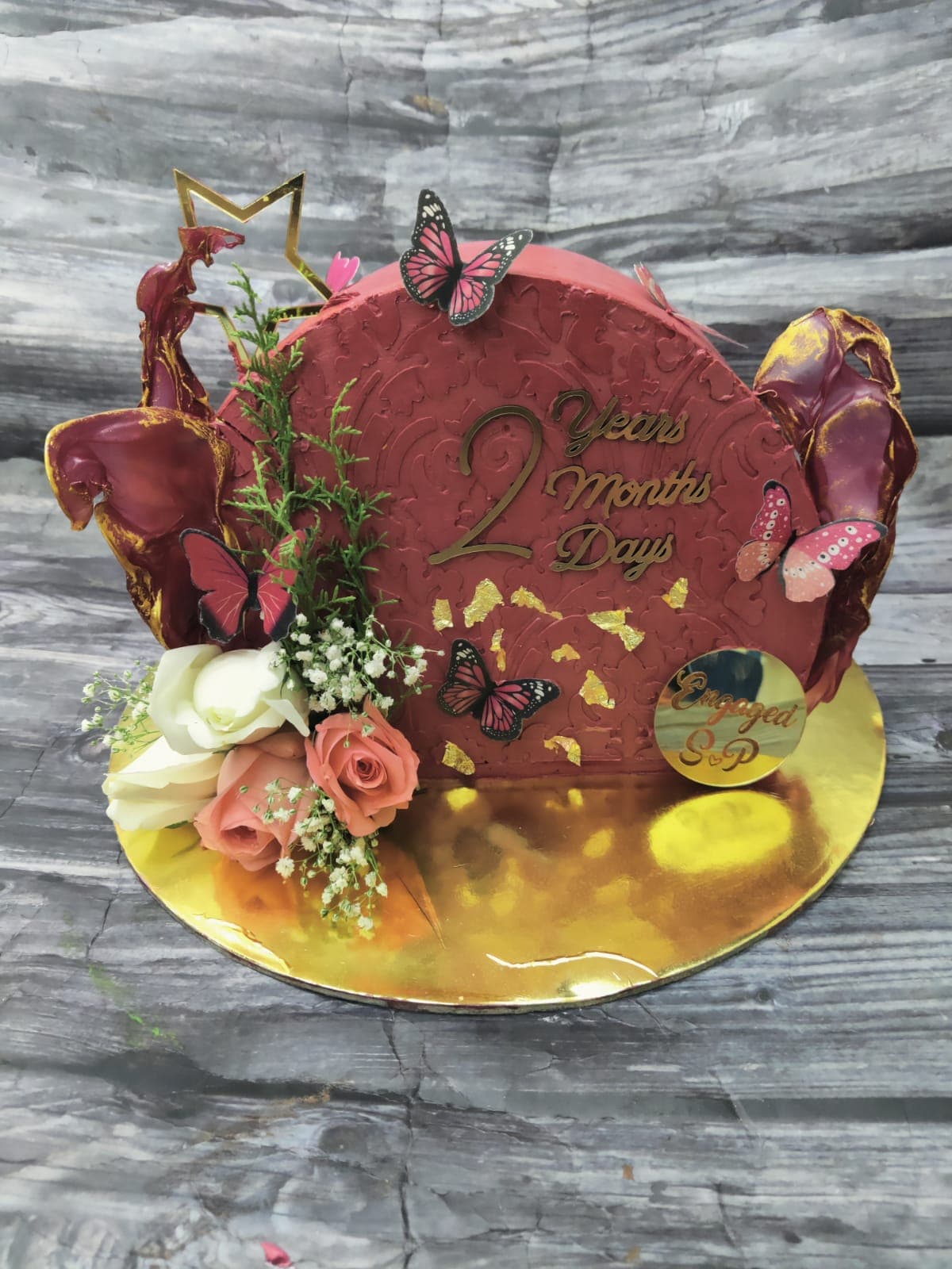 Standing engagement celebration cake