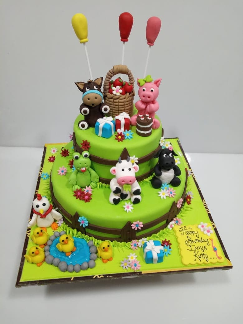 Farm animals themed birthday cake